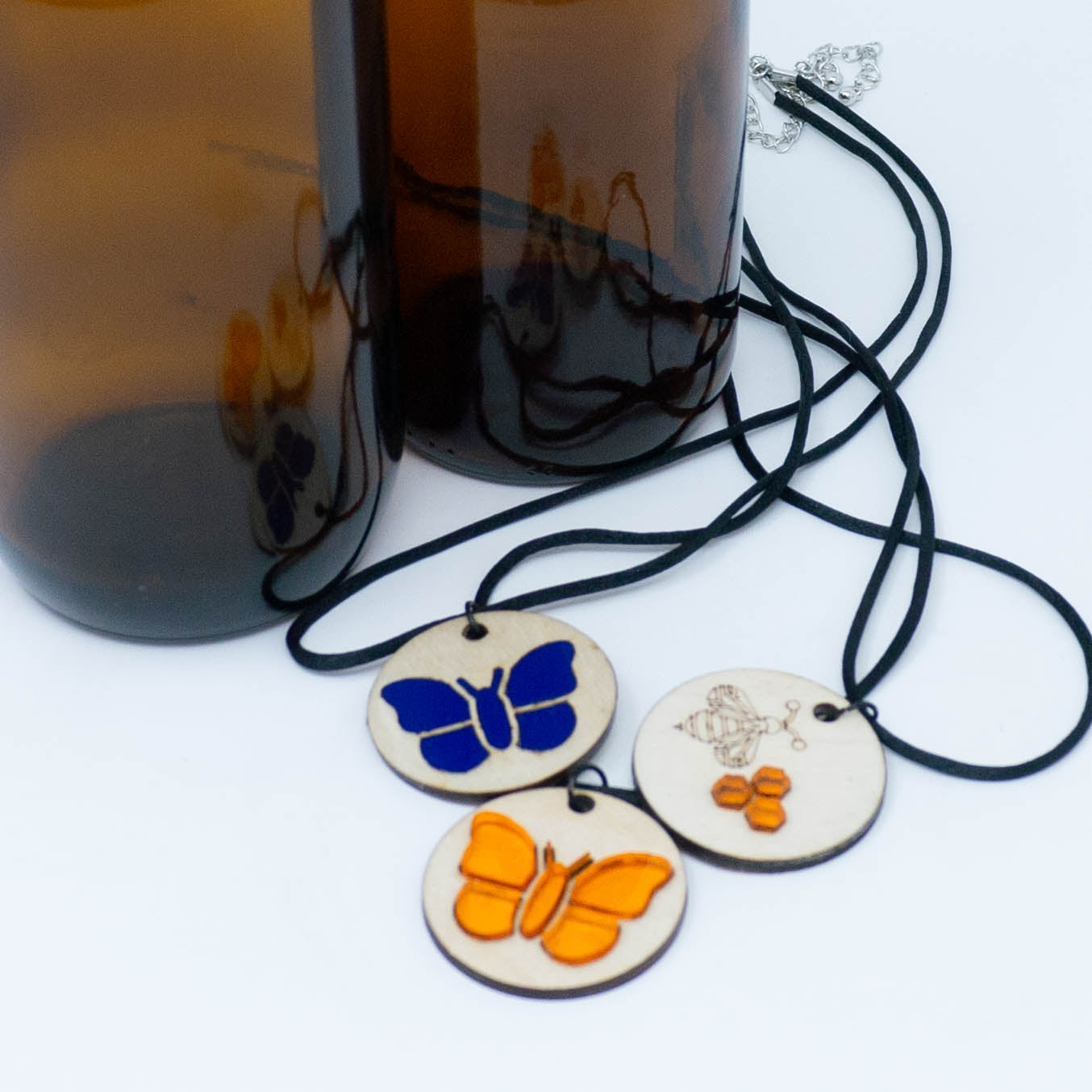 Laser-cut Wood and Acrylic Pendants